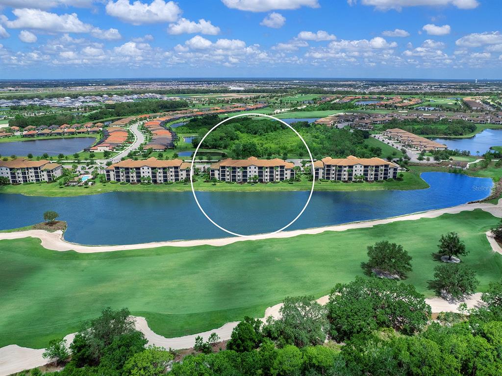 17108 Vardon Terrace, Unit 203 Lakewood Ranch, FL 34211 - Photo 4 of 50 a view of a city with an ocean