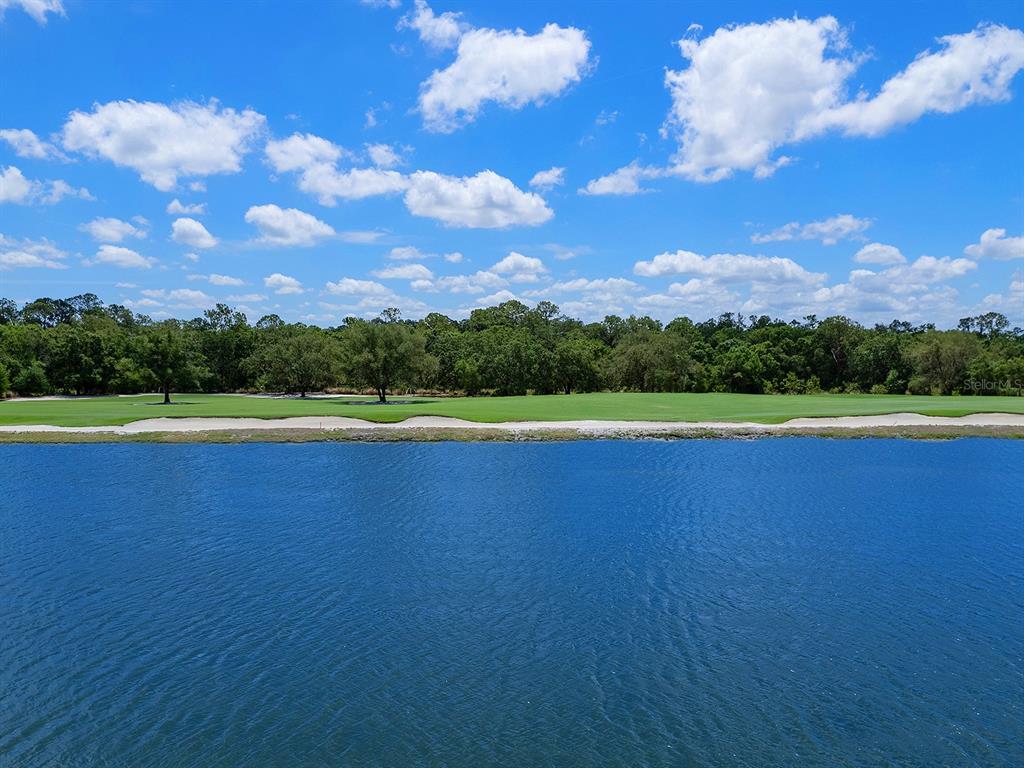 17108 Vardon Terrace, Unit 203 Lakewood Ranch, FL 34211 - Photo 10 of 50 a view of an outdoor space and a lake view