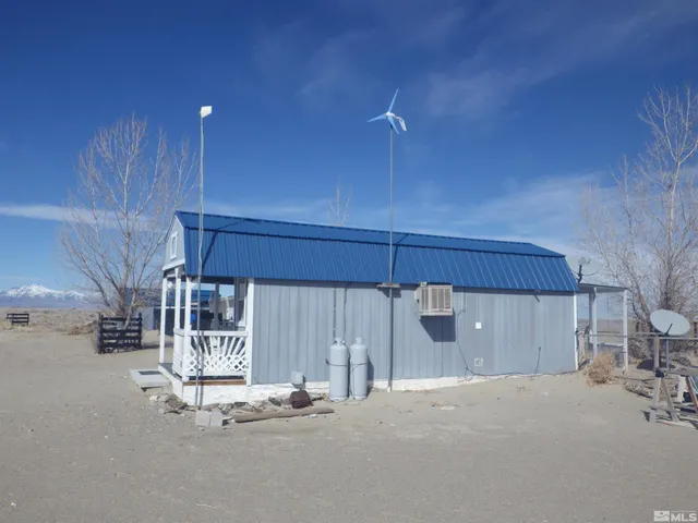 a view of a house with a snow