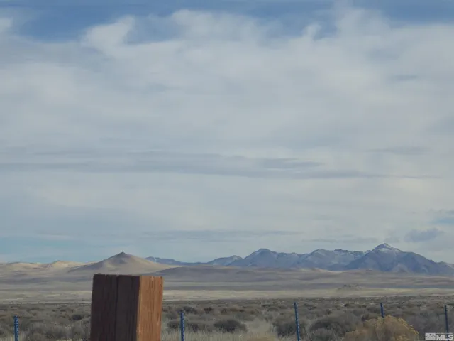 an aerial view of beach and city