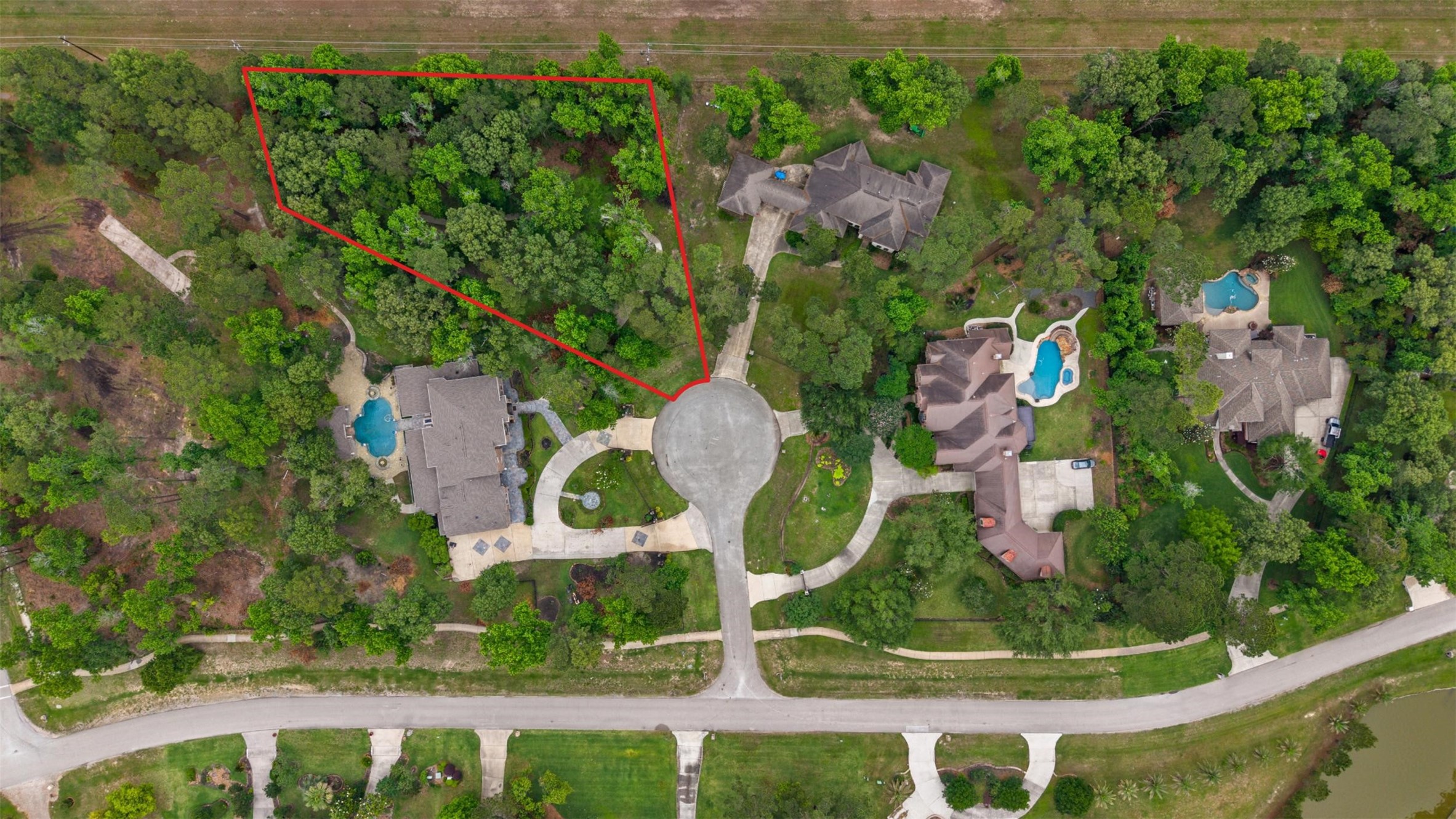 4107 Stratus Court Spring, TX 77386 - Photo 14 of 16 an aerial view of a house with garden space and trees
