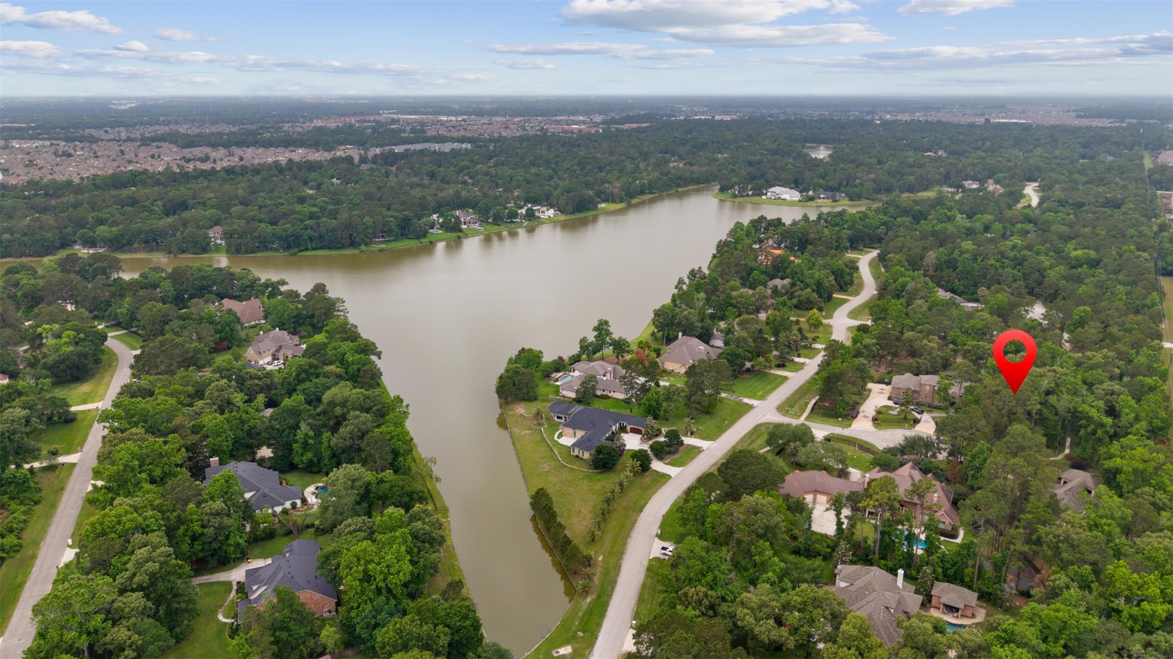 4107 Stratus Court Spring, TX 77386 - Photo 16 of 16 an aerial view of residential building with outdoor space and lake view
