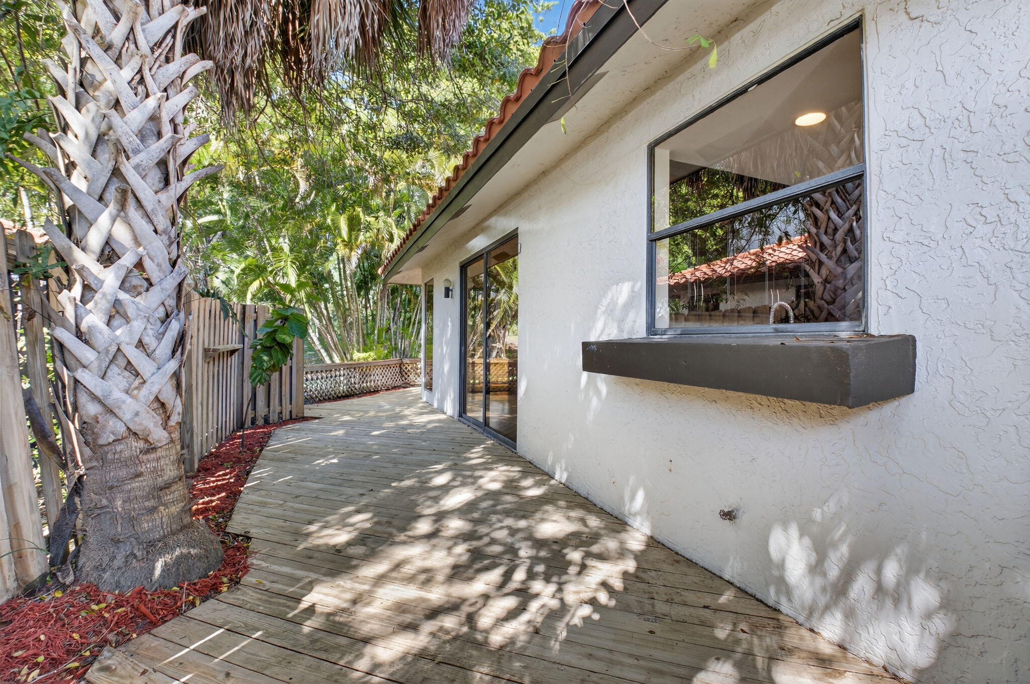 5845 Fox Hollow Drive, Unit A Boca Raton, FL 33486 - Photo 23 of 50 a view of a backyard