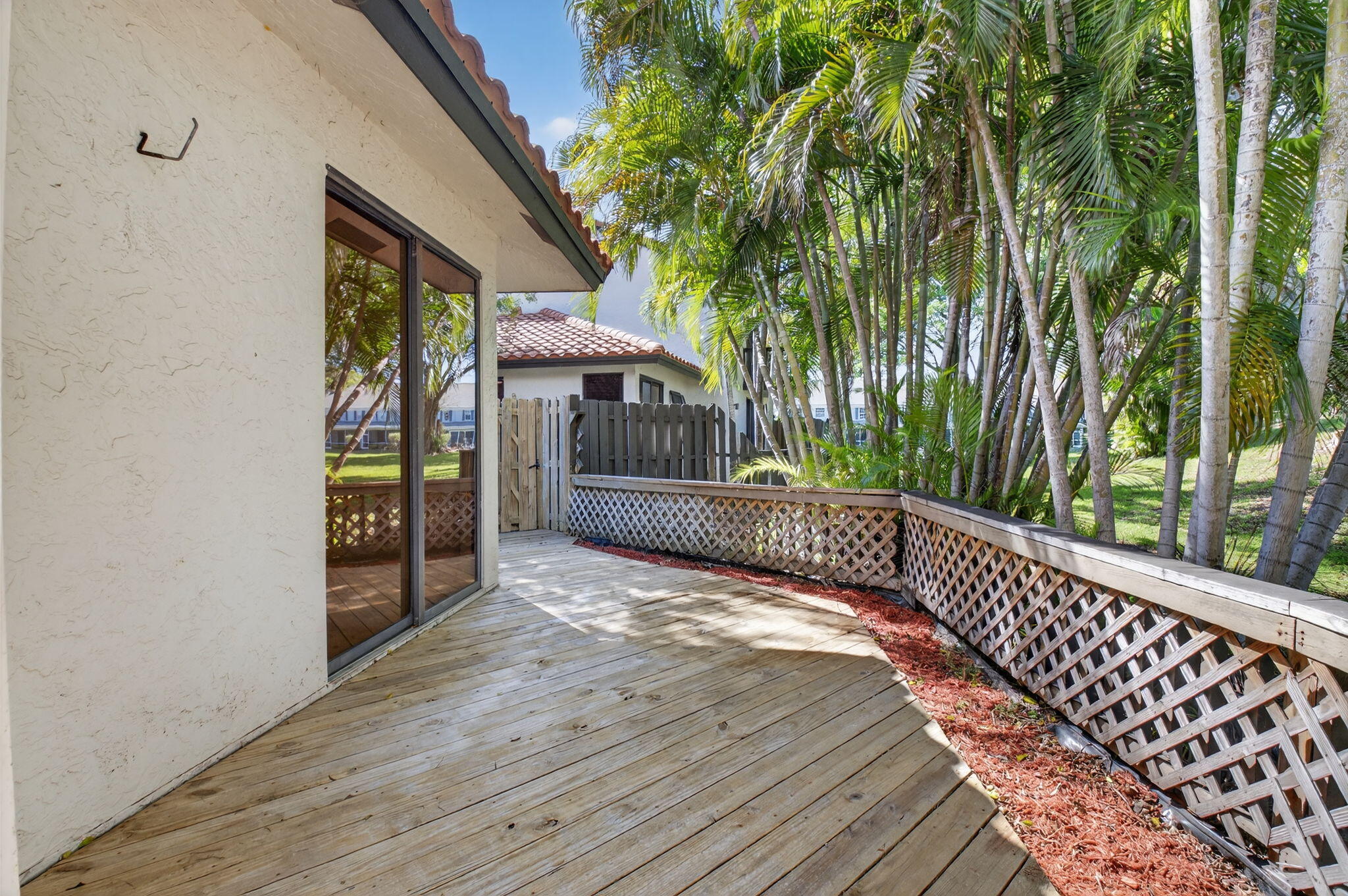 5845 Fox Hollow Drive, Unit A Boca Raton, FL 33486 - Photo 25 of 50 a view of outdoor space and deck