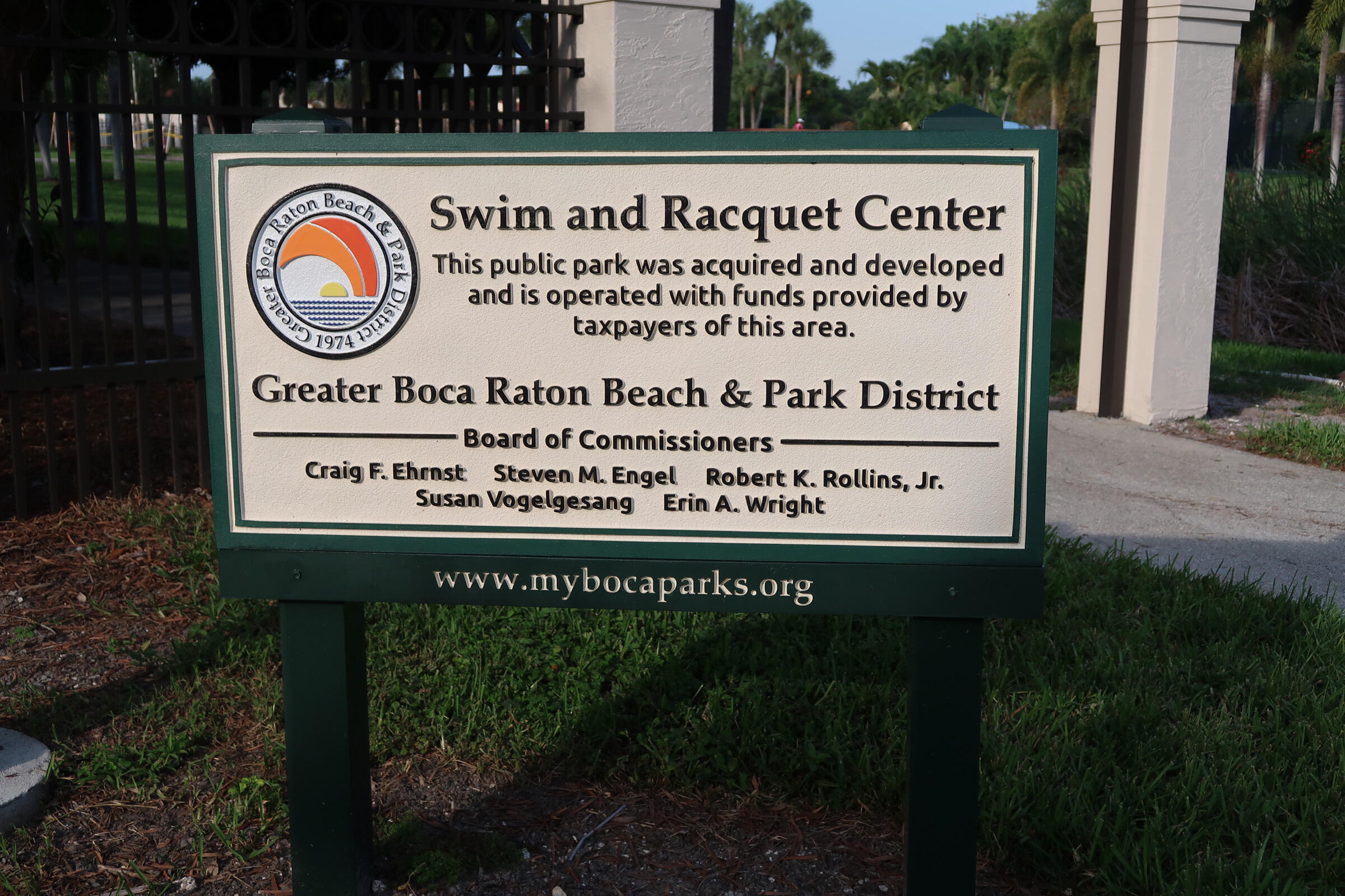 5845 Fox Hollow Drive, Unit A Boca Raton, FL 33486 - Photo 43 of 50 a sign on the wall of the house