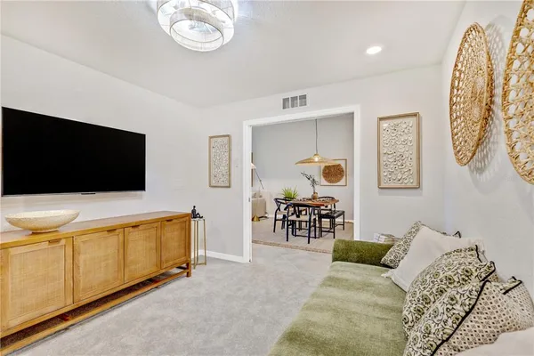 a bathroom with a shower sink and mirror