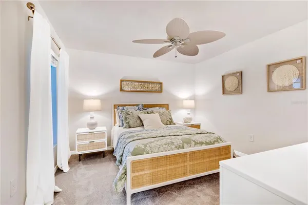 a building outdoor space with patio furniture and potted plants