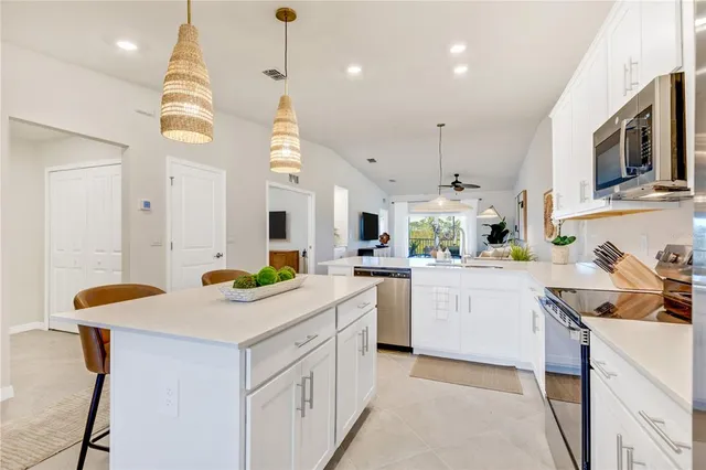 a view of a livingroom with furniture and window