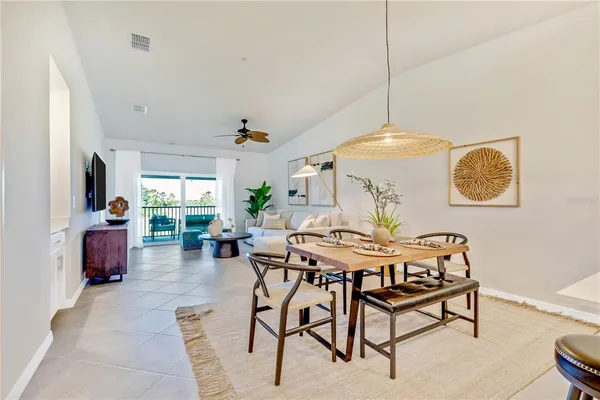a view of a dining room with furniture
