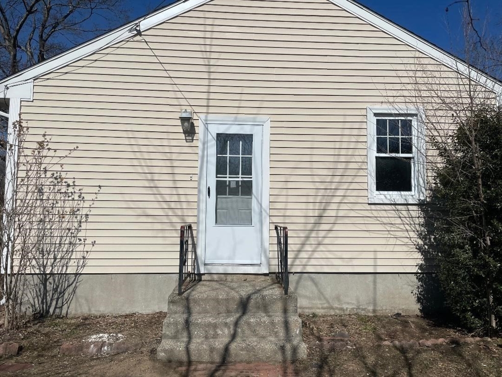 210 Navajo Road Springfield, MA 01109 - Photo 4 of 38 a view of a white house