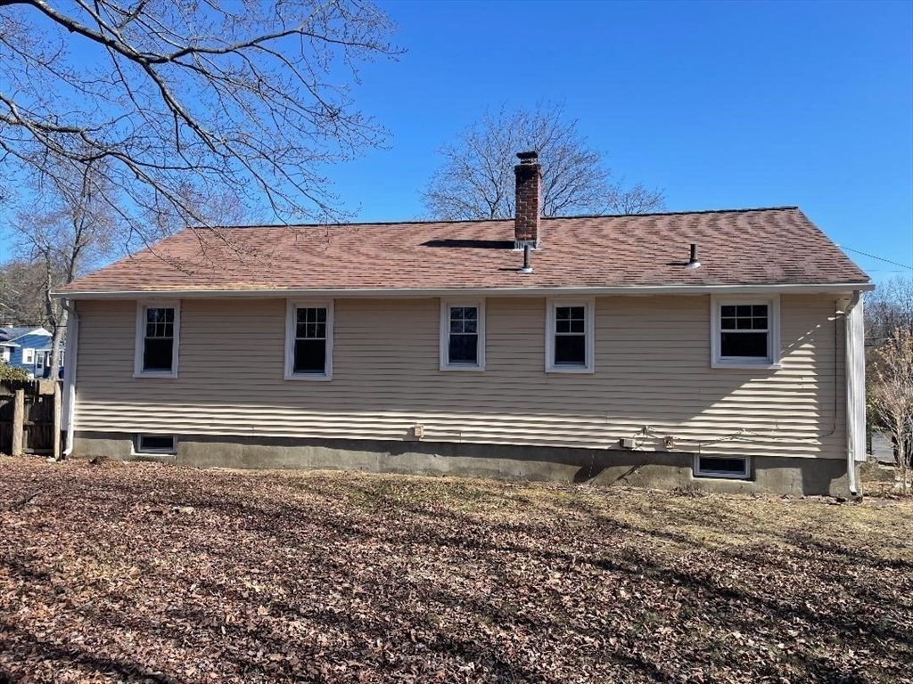 210 Navajo Road Springfield, MA 01109 - Photo 5 of 38 a house view with a backyard space