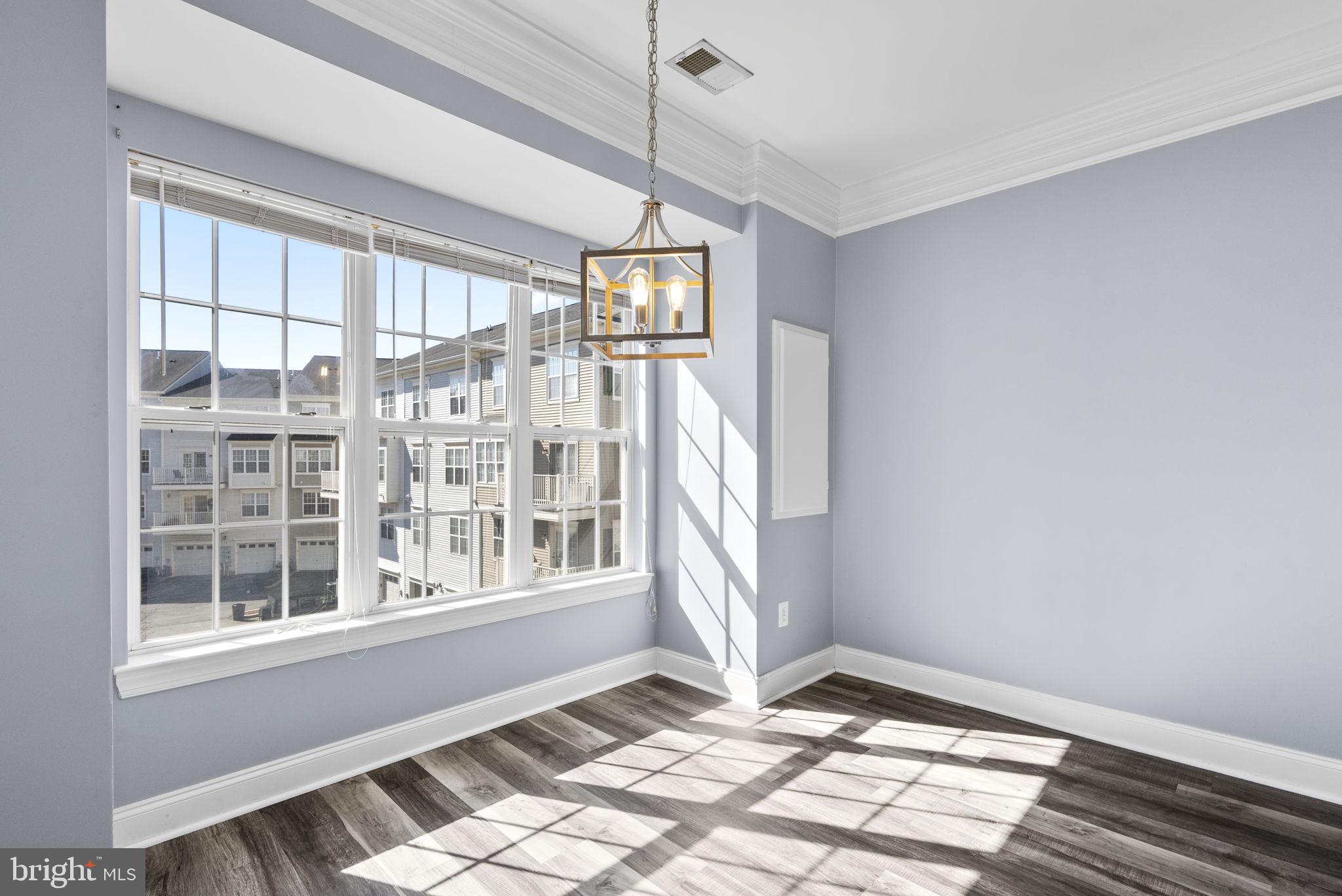 932 Orchard Ridge Drive, Unit 200 Gaithersburg, MD 20878 - Photo 21 of 51 a view of an empty room with a window