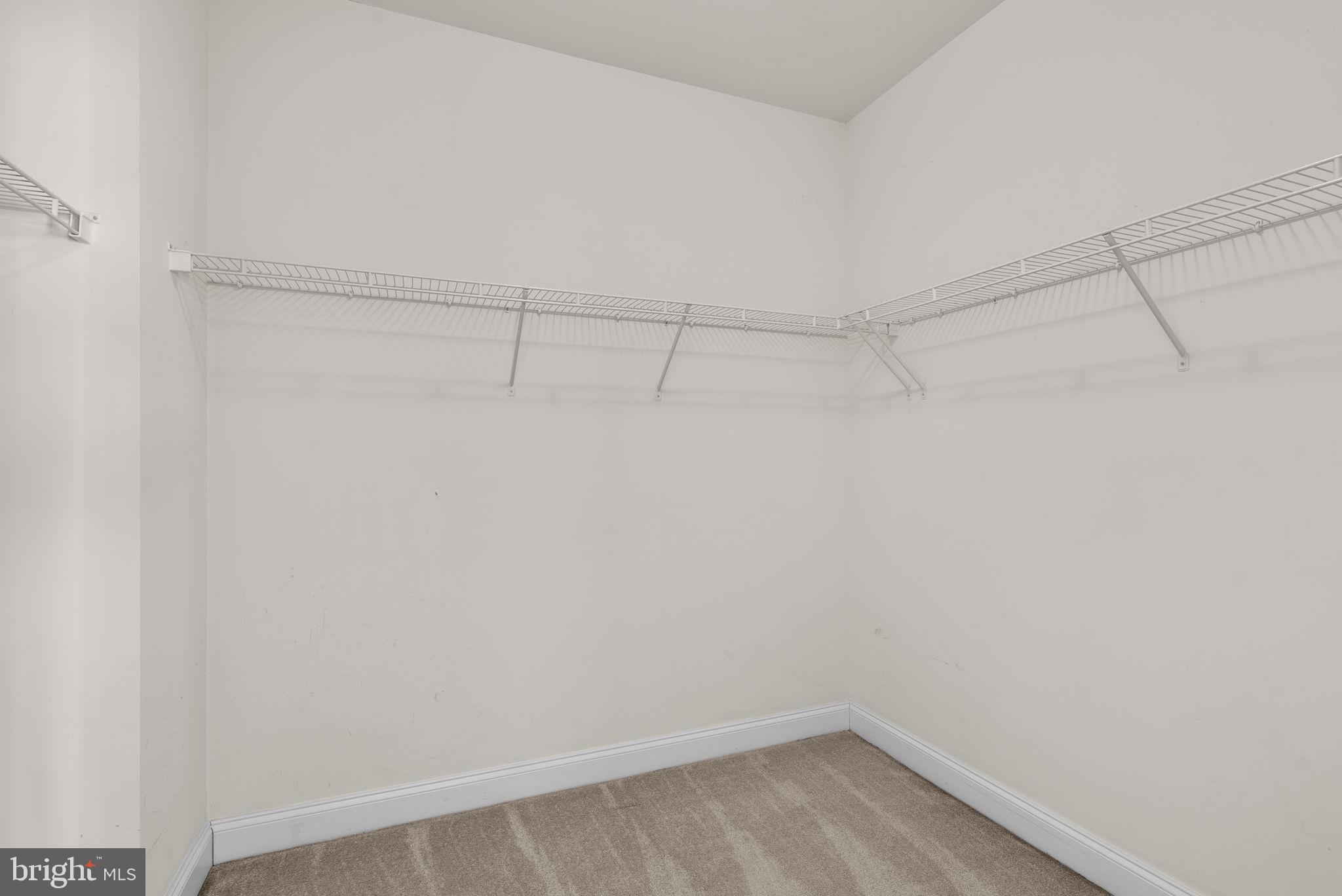 932 Orchard Ridge Drive, Unit 200 Gaithersburg, MD 20878 - Photo 36 of 51 a view of a room with racks on the wall