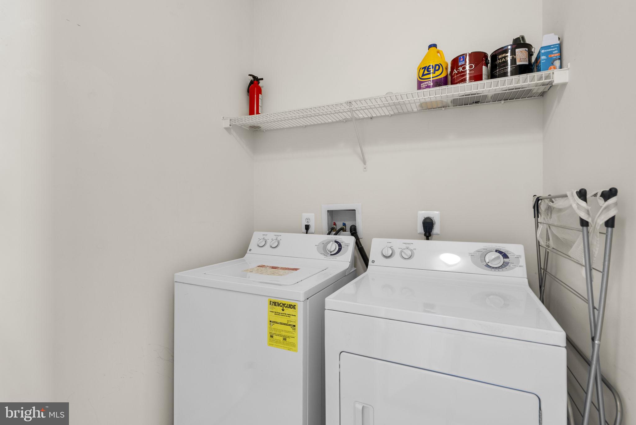 932 Orchard Ridge Drive, Unit 200 Gaithersburg, MD 20878 - Photo 37 of 51 a utility room with dryer and washer