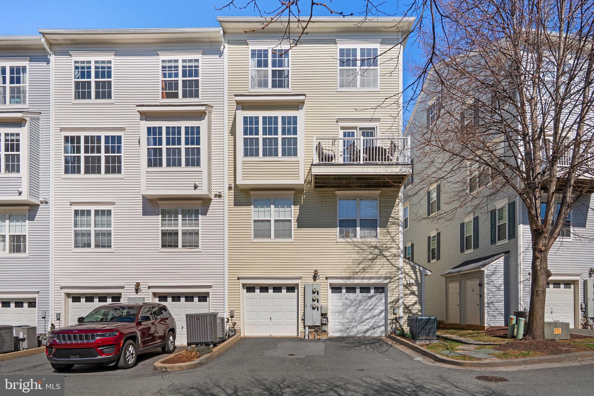 932 Orchard Ridge Drive, Unit 200 Gaithersburg, MD 20878 - Photo 44 of 51 a view of a street that has couple of cars parked on the road