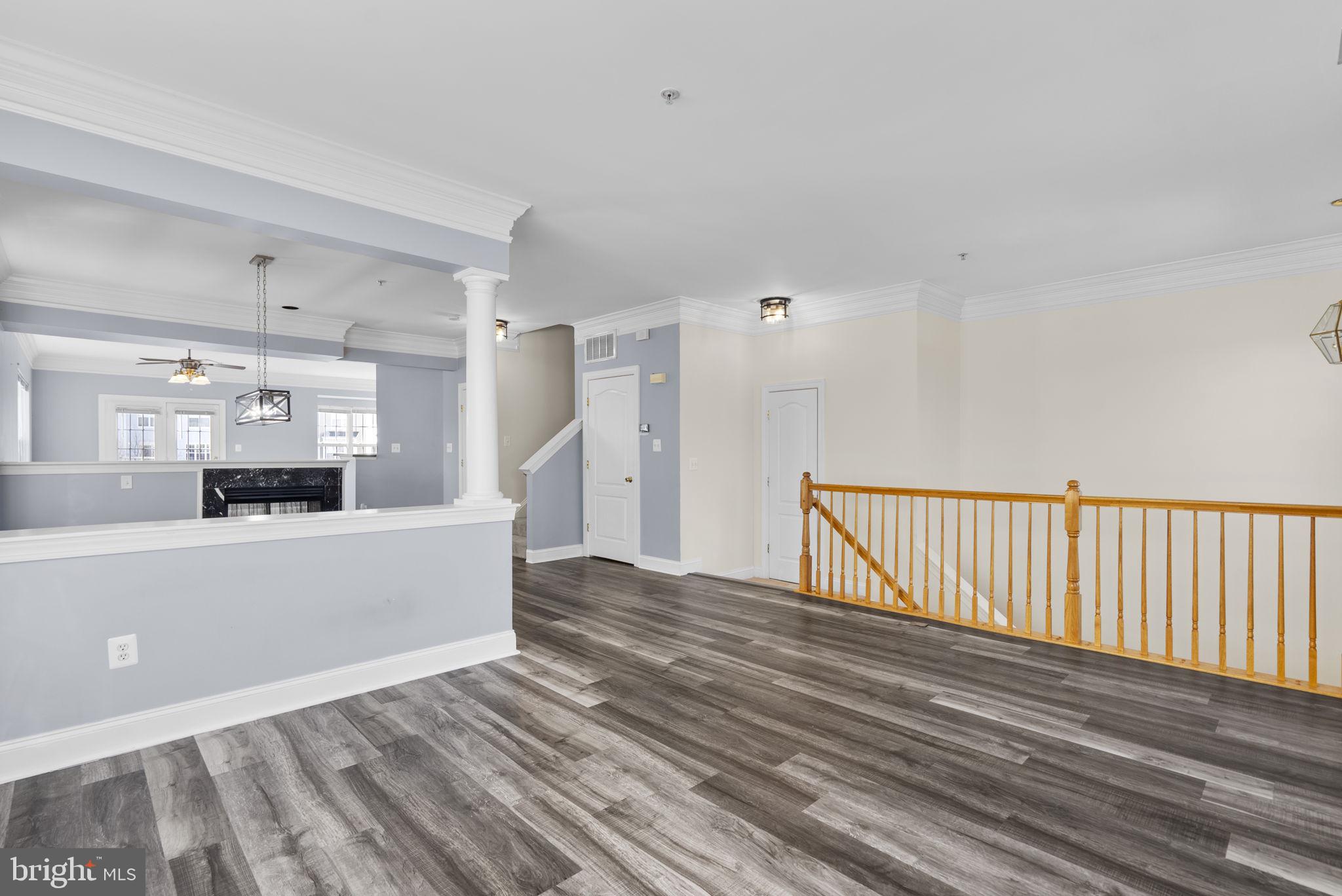 932 Orchard Ridge Drive, Unit 200 Gaithersburg, MD 20878 - Photo 8 of 51 a view of a kitchen with wooden floor