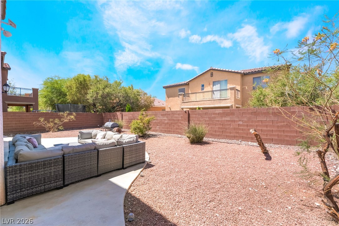 8358 Nelson Ridge Lane Las Vegas, NV 89178 - Photo 39 of 43 A spacious backyard retreat awaits, complete with a private patio and low-maintenance landscaping for effortless outdoor living.