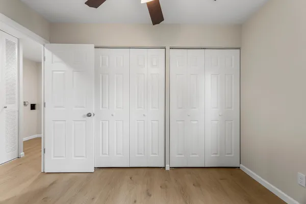 a view of room with hardwood floor