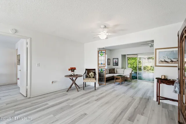 a kitchen with a sink stove and refrigerator