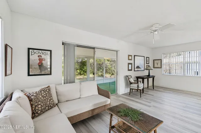 a bedroom with a bed and a desk