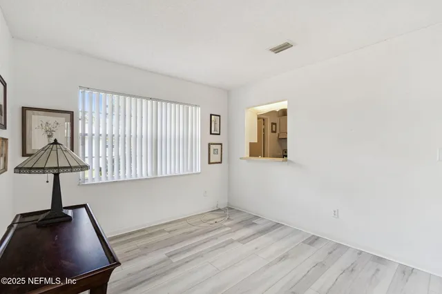 a bathroom with a granite countertop shower