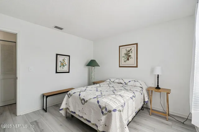 a view of backyard with tub and shower