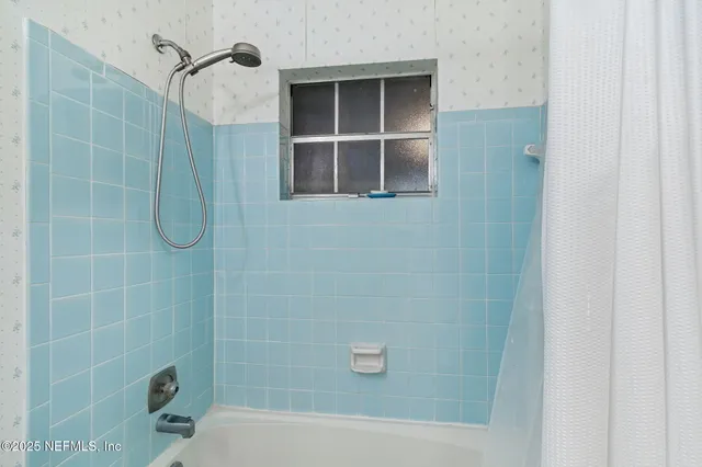 a house view with a backyard space