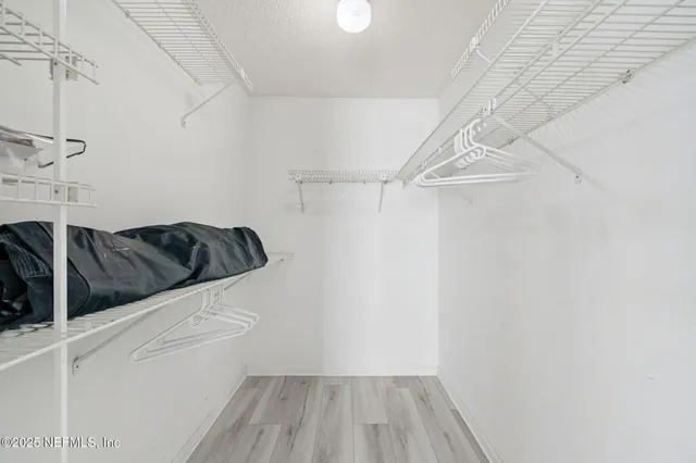 an aerial view of residential building with parking space