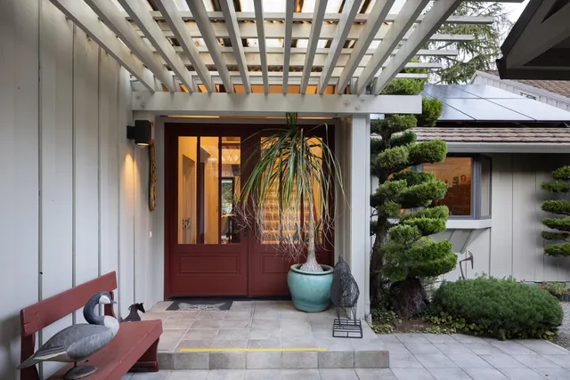 a view of an entryway with a garden