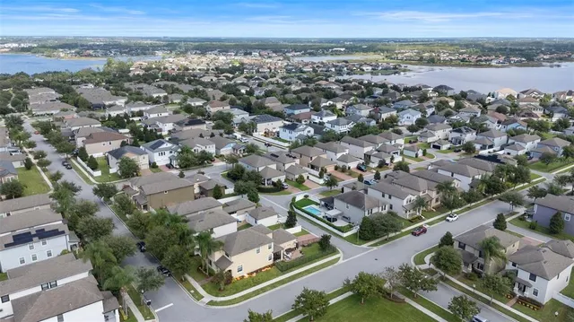 an aerial view of a city with lots of residential buildings