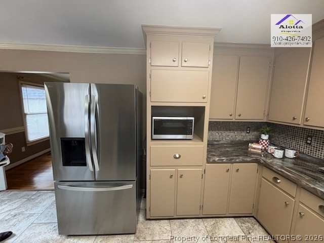 1817 McGougan Road Fayetteville, NC 28303 - Photo 12 of 24 a kitchen with a refrigerator sink and microwave