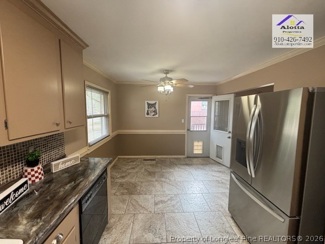 1817 McGougan Road Fayetteville, NC 28303 - Photo 13 of 24 a kitchen with granite countertop a refrigerator and a stove