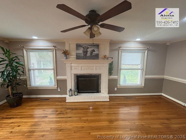 1817 McGougan Road Fayetteville, NC 28303 - Photo 15 of 24 a view of empty room with a fireplace and windows