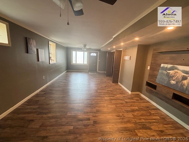 1817 McGougan Road Fayetteville, NC 28303 - Photo 23 of 24 a view of a hallway with wooden floor and a living room