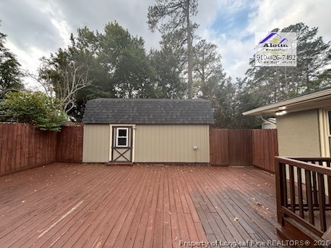 1817 McGougan Road Fayetteville, NC 28303 - Photo 4 of 24 a view of a house with a wooden deck