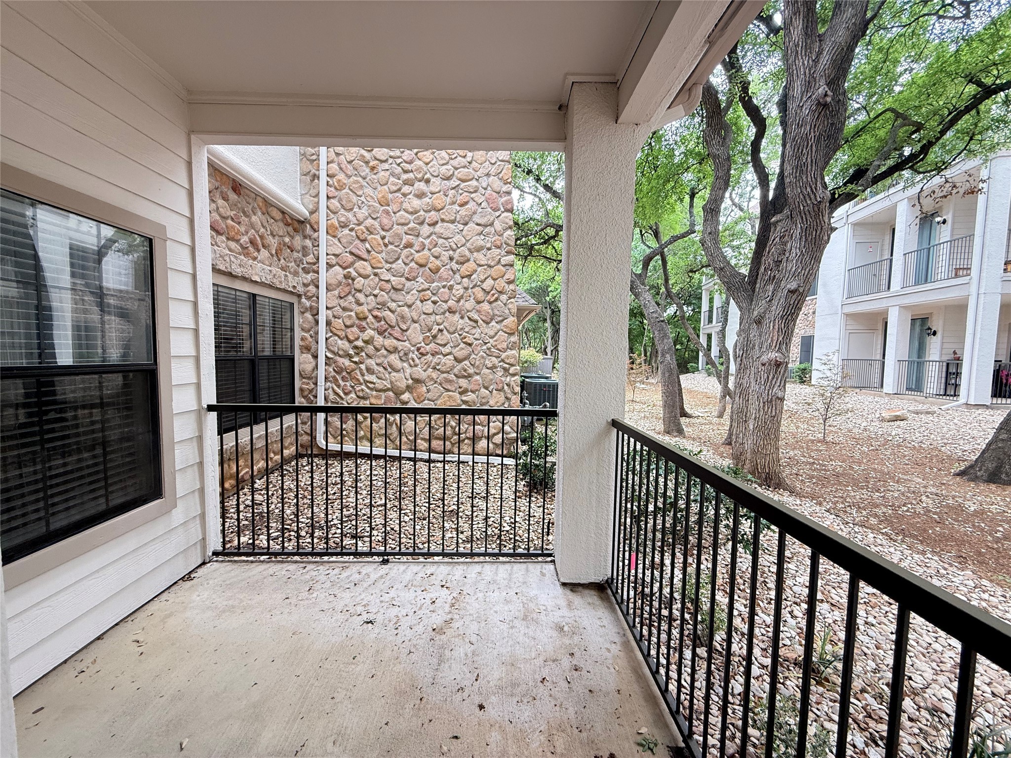6607 Brodie Lane, Unit 535 Austin, TX 78745 - Photo 10 of 12 a street view from balcony