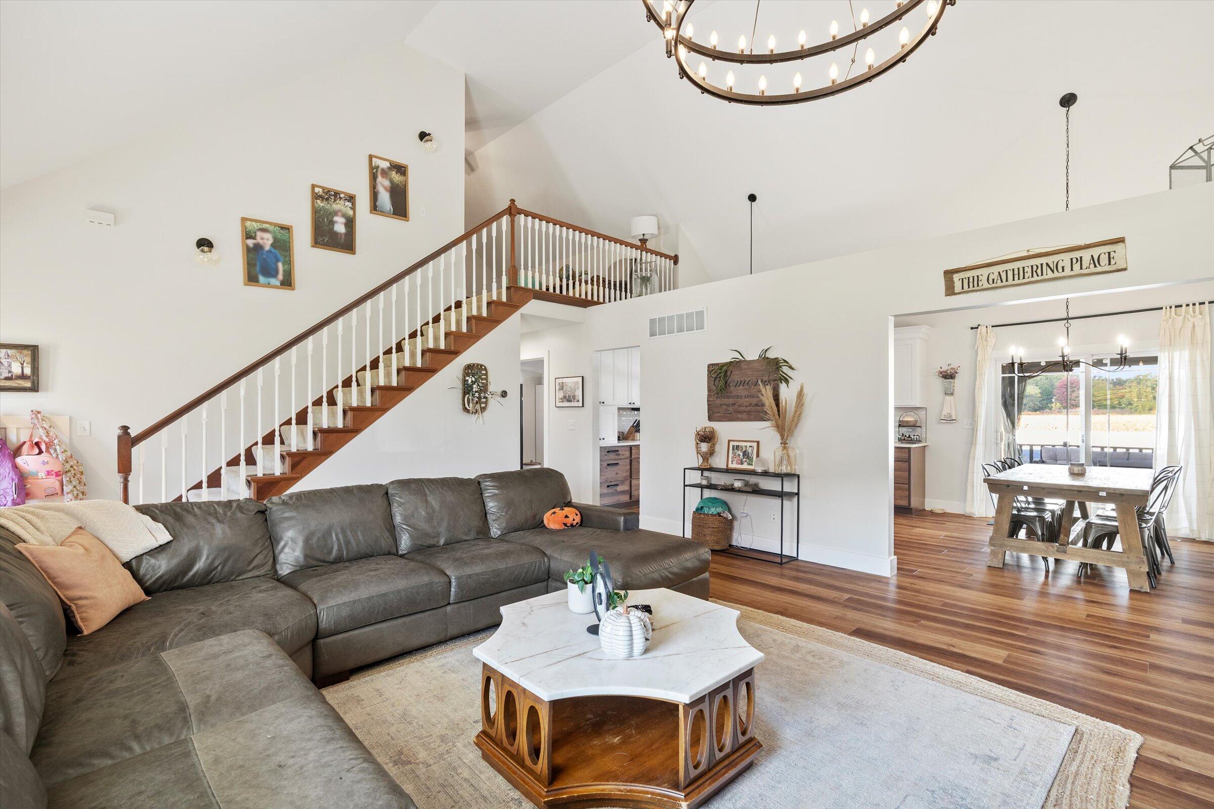408 Coyote Trail Kouts, IN 46347 - Photo 11 of 36 a living room with furniture and wooden floor