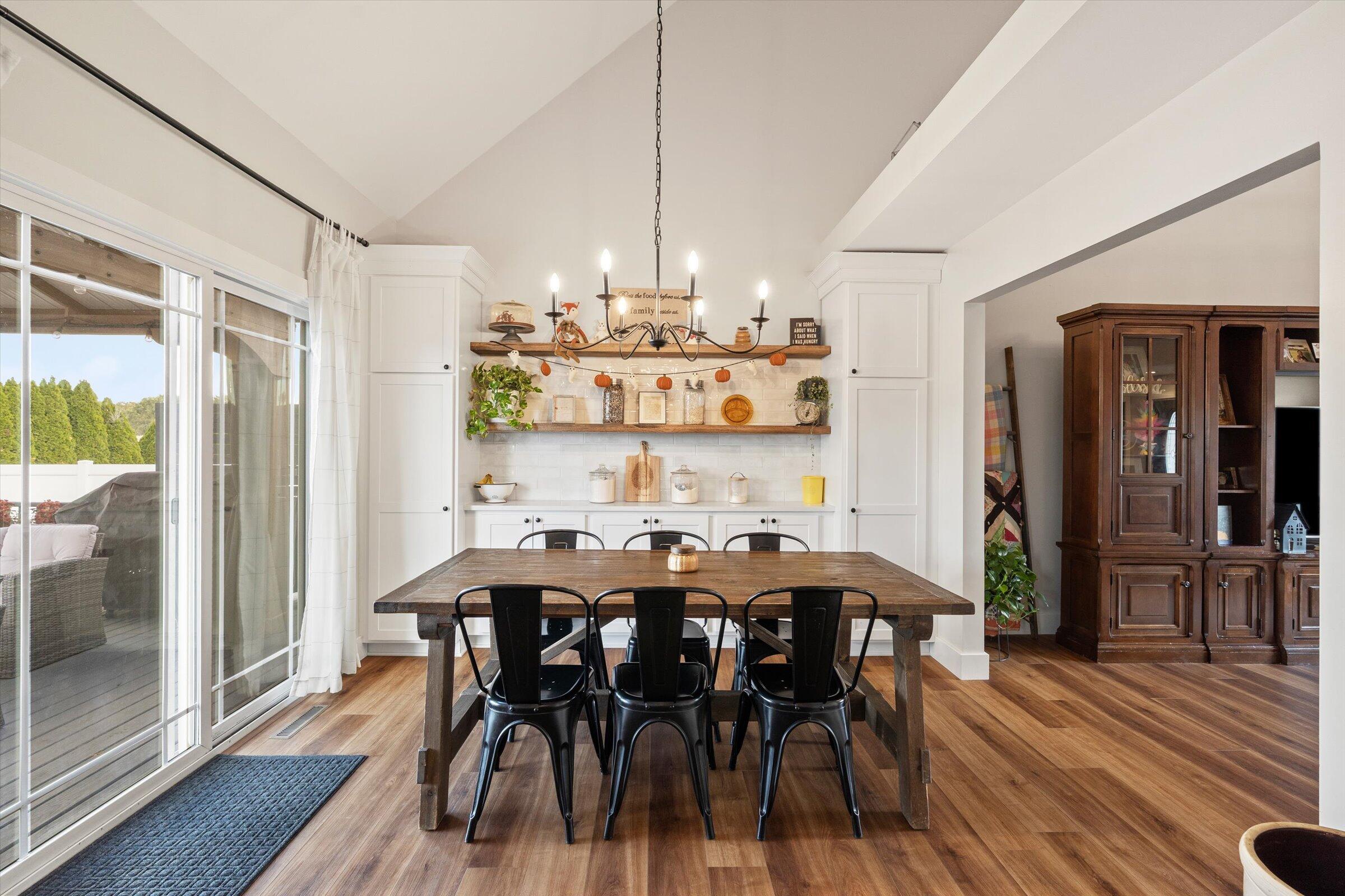 408 Coyote Trail Kouts, IN 46347 - Photo 14 of 36 a view of a dining room with furniture and wooden floor