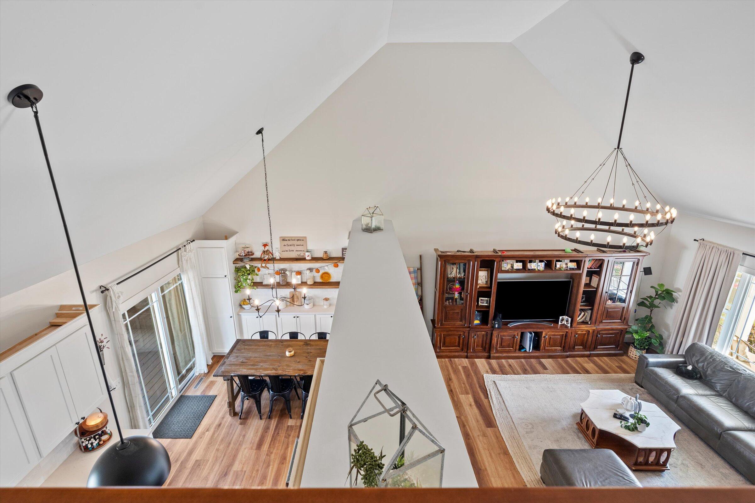 408 Coyote Trail Kouts, IN 46347 - Photo 19 of 36 a living room with furniture and a flat screen tv