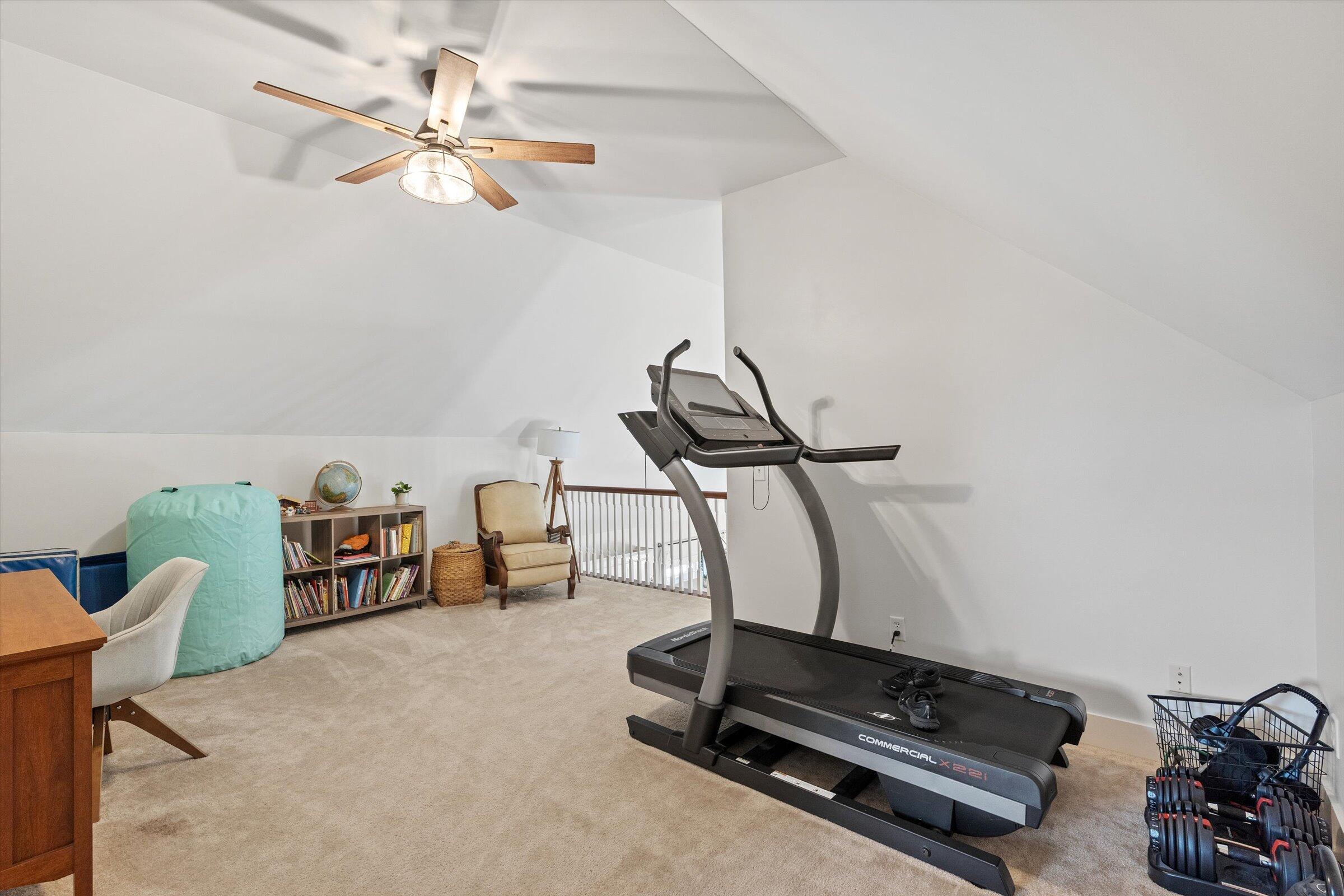 408 Coyote Trail Kouts, IN 46347 - Photo 21 of 36 a room with gym equipment