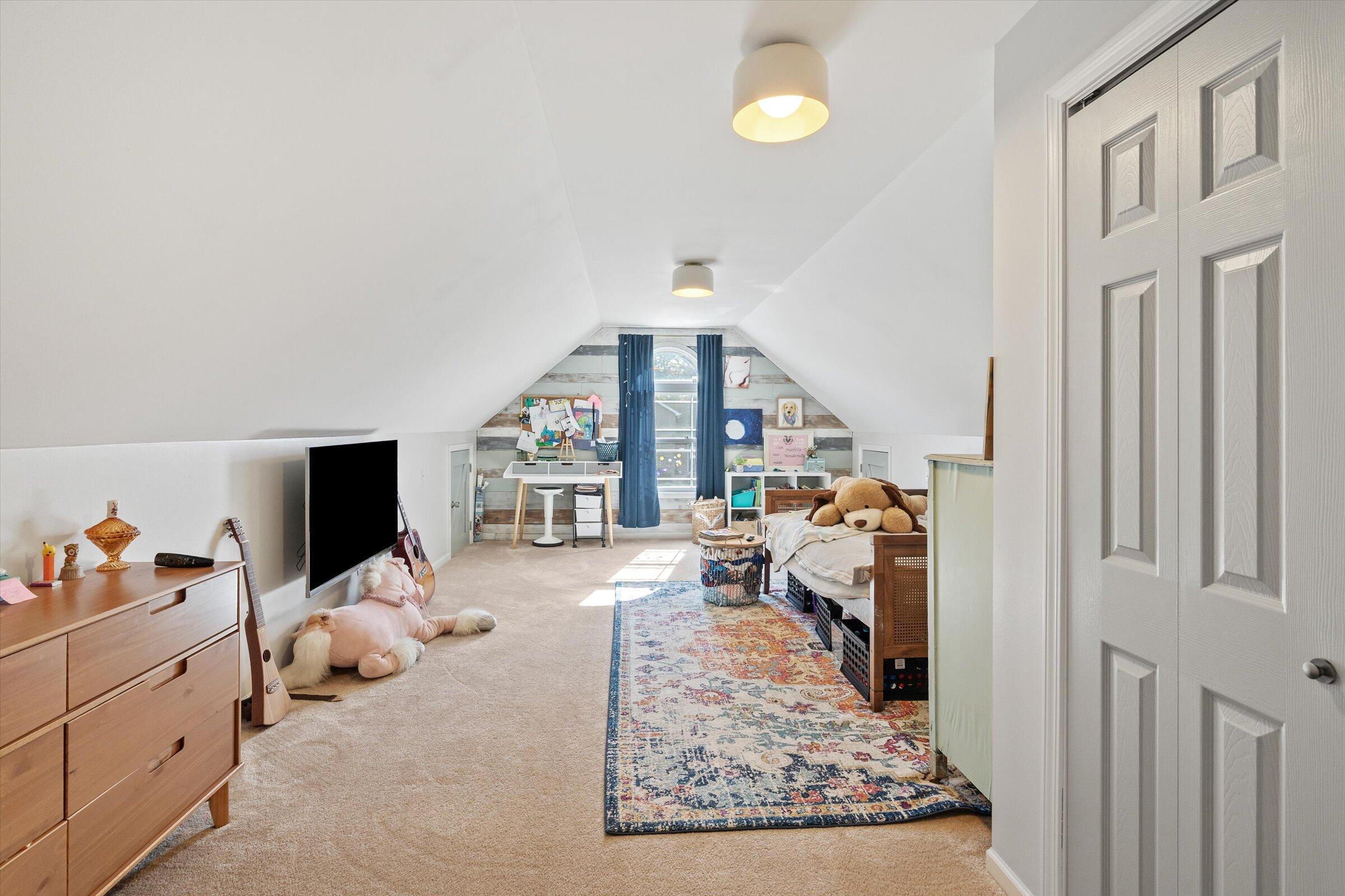 408 Coyote Trail Kouts, IN 46347 - Photo 24 of 36 a living room with furniture and a flat screen tv