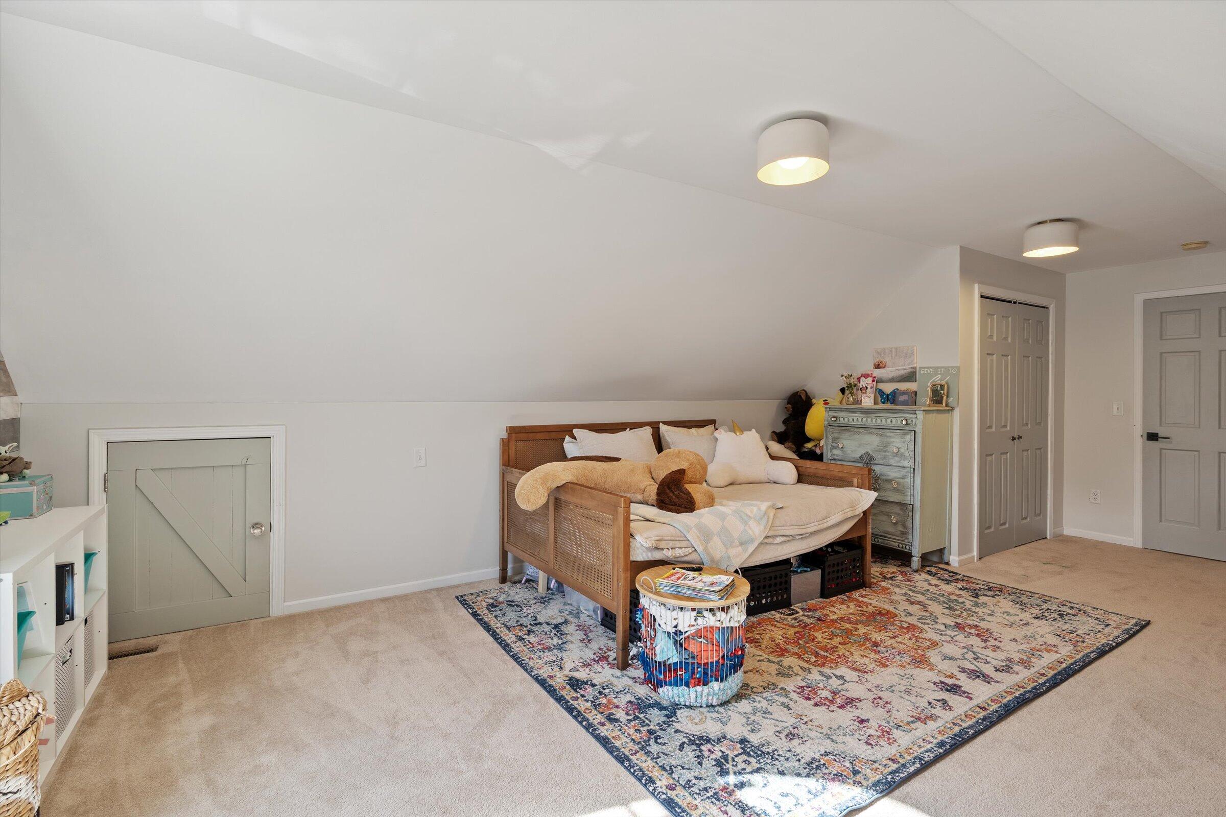 408 Coyote Trail Kouts, IN 46347 - Photo 25 of 36 a living room with a rug