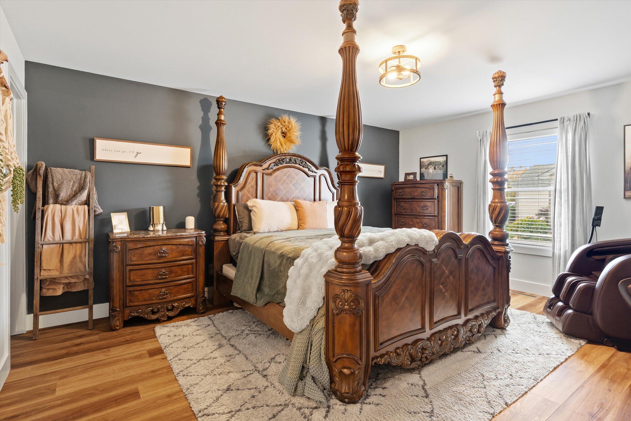 408 Coyote Trail Kouts, IN 46347 - Photo 26 of 36 a bedroom with a bed and furniture