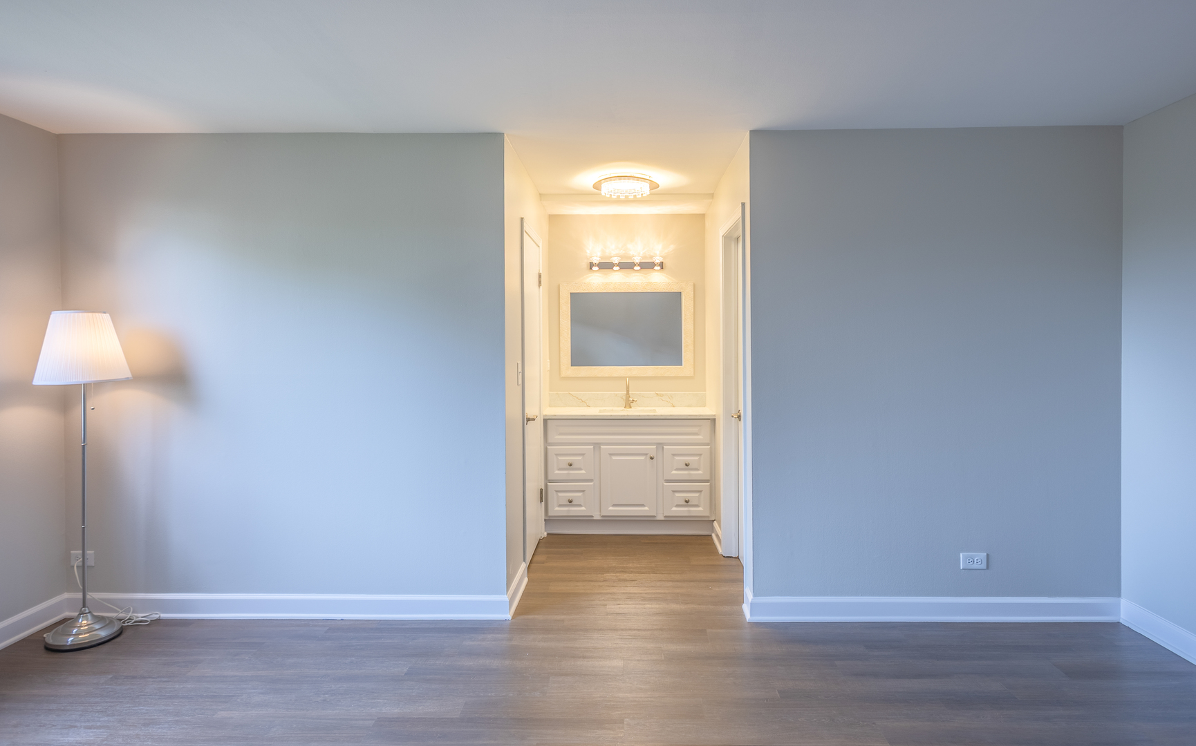 450 Raintree Court, Unit 2B Glen Ellyn, IL 60137 - Photo 16 of 28 wooden floor in an empty room