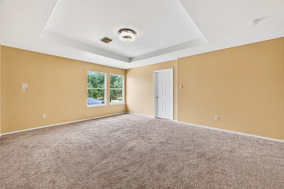 634 Hawthorne Pasture Road Rosenberg, TX 77471 - Photo 26 of 49 a view of a livingroom with an empty space and a window