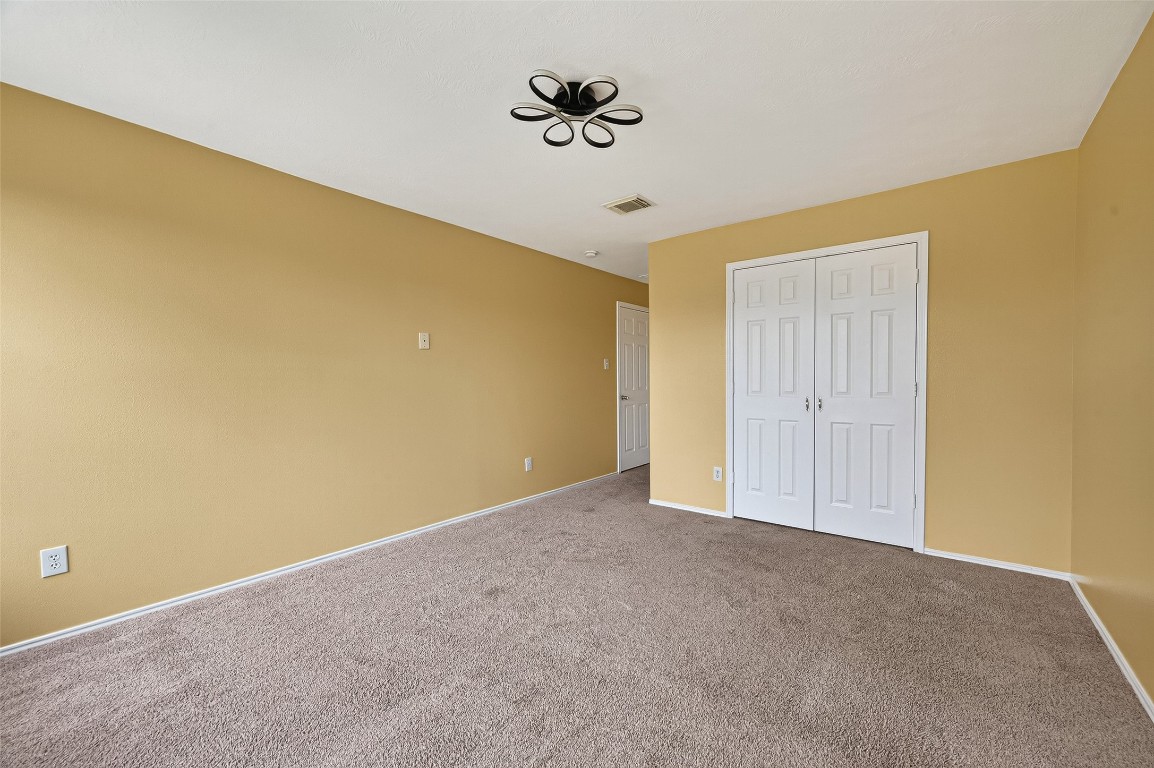 634 Hawthorne Pasture Road Rosenberg, TX 77471 - Photo 36 of 49 a view of an empty room with a window
