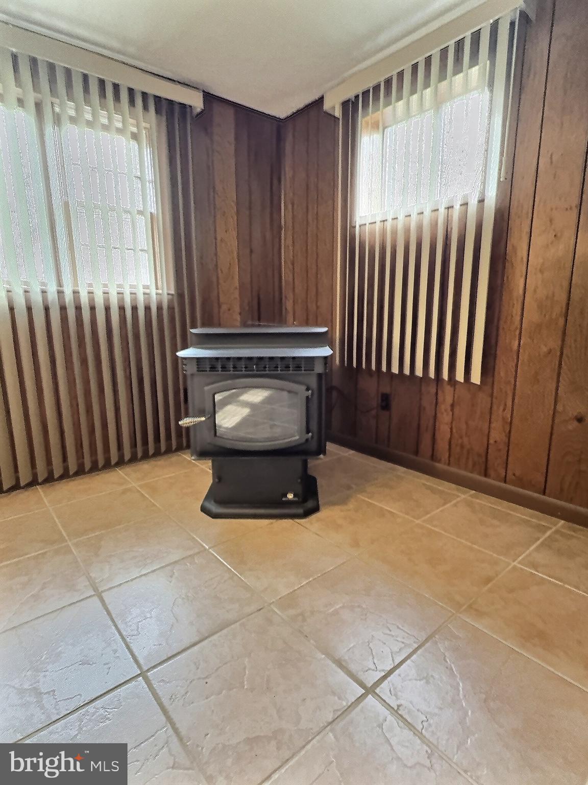 6639 Bucknell Road Bryans Road, MD 20616 - Photo 13 of 28 a view of an empty room with wooden floor and a window