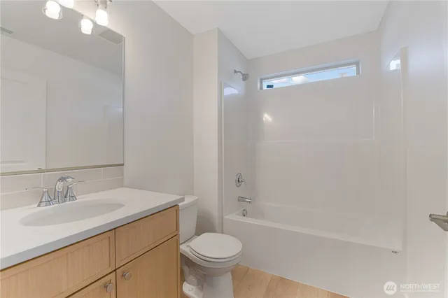 a bathroom with a sink toilet and a bathtub
