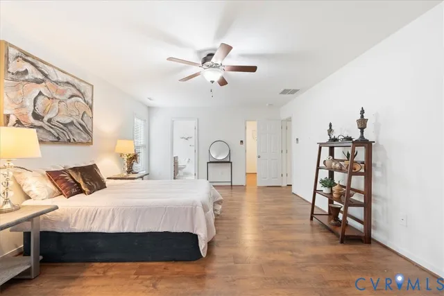 a bedroom with a bed furniture and a window
