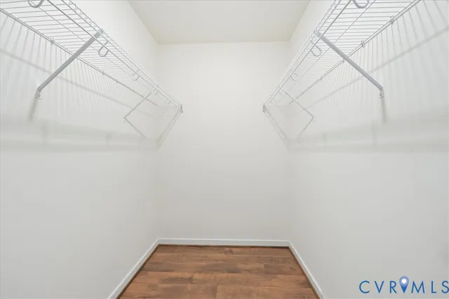 a view of small space with empty racks on the wall